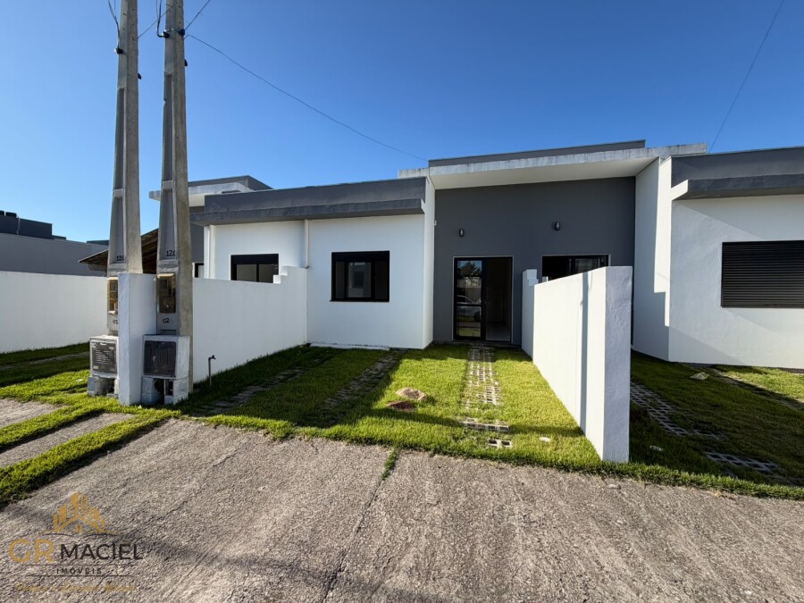 Casa geminada com 2 dormitórios em Passo de Torres